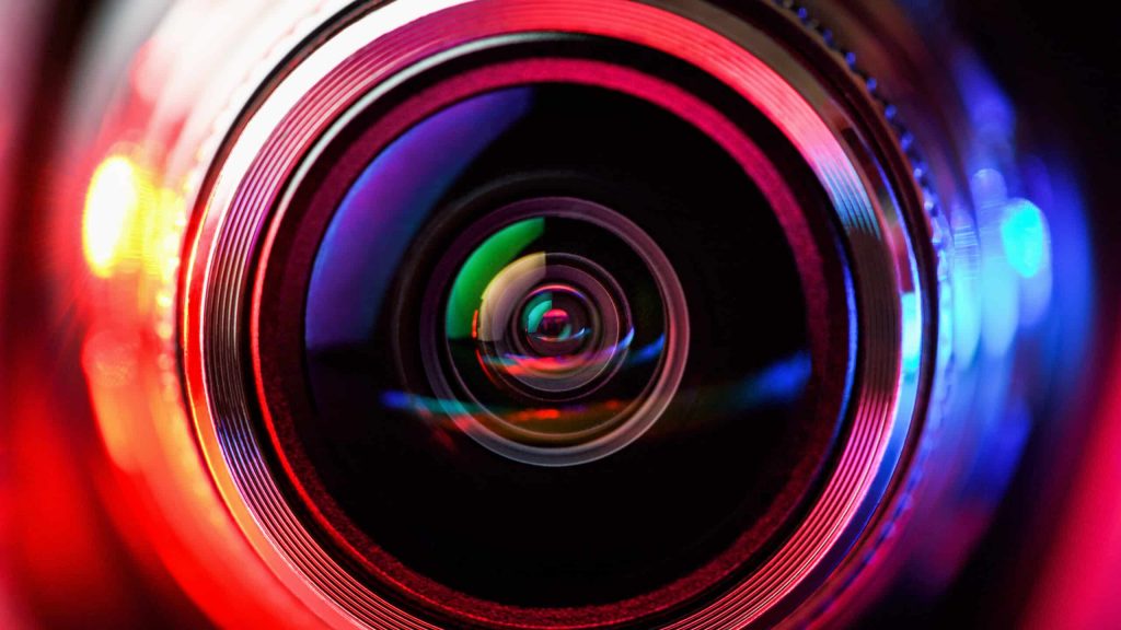 Camera lens with red and blue backlight. Macro photography lense